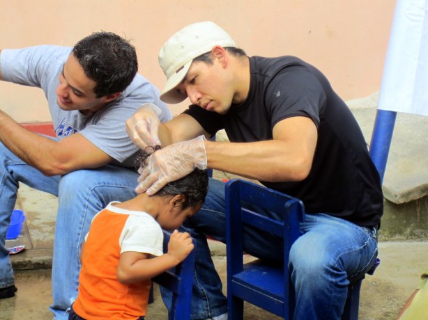 These kids were adorable and still as water ran down their eyes and faces while we shampooed their tiny heads